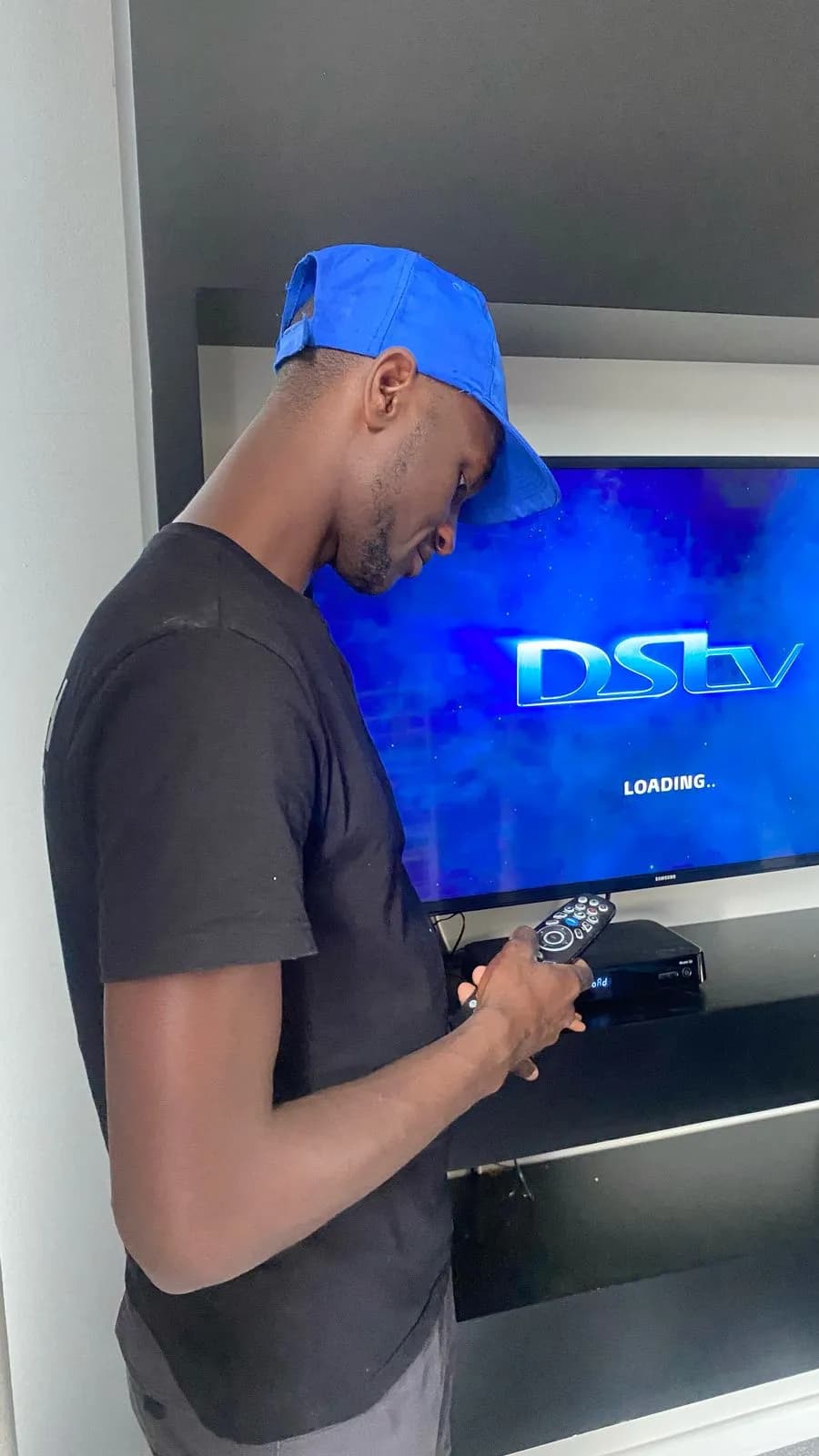 Happy family watching DStv